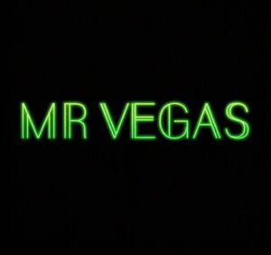 Neon green “MR VEGAS” text glowing against a solid black background.